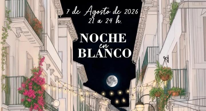 Pareja caminando en la noche en blanco de Benavente con bolsas de compras